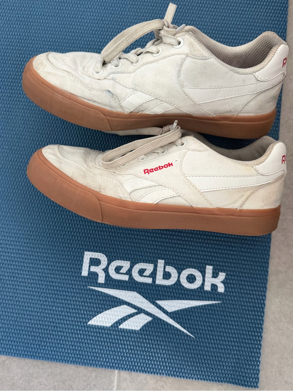 Reebok Low-Top Sneakers in White with Gum Sole and Red Logo